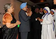 The Prime Minister, Dr. Manmohan Singh meeting the nuns from missionaries of charity at a reception for Indian community hosted by the Indian High Commissioner, in Dar es Salaam, Tanzania on May 26, 2011. Smt. Gursharan Kaur, the Union Minister for External Affairs, Shri S.M. Krishna and the Indian High Commissioner, Shri K.V. Bhagirath is also seen.