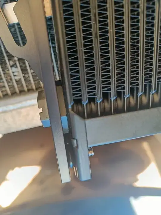 Factory rubber o-rings between bracket and oil cooler mounting tab