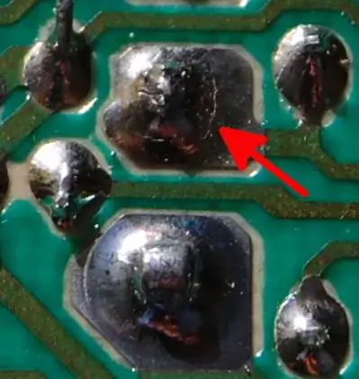 Stress crack in solder on flasher relay pins