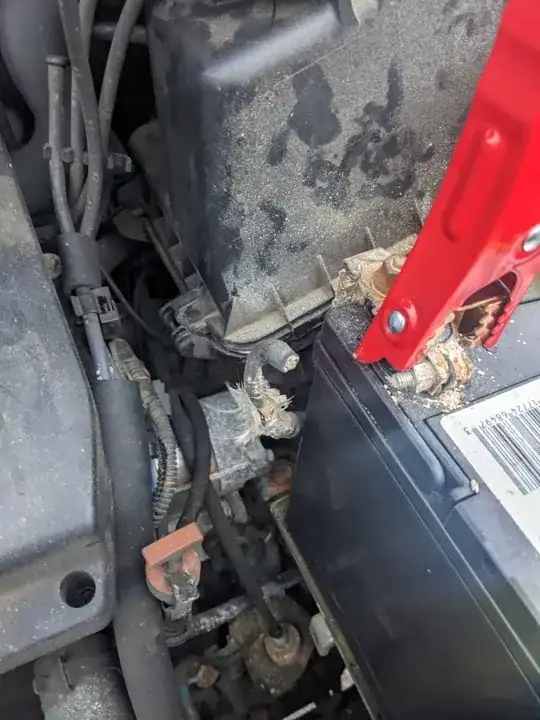 battery in 2001 Toyota Highlander, disconnected black cable to left of positive terminal