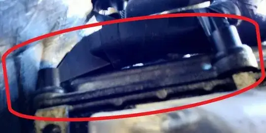 Two of the bolt clips on the harness from underneath the truck