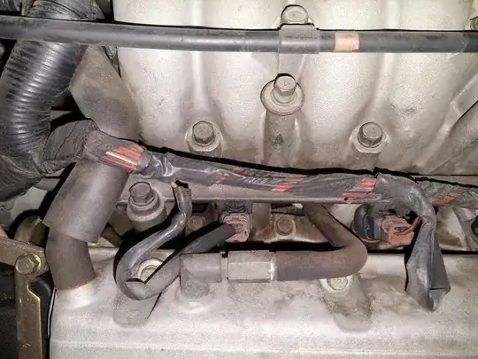 Close Up of Hoses Connected to Front Rocker Cover