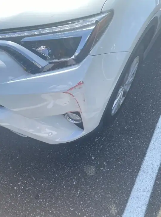 Red Scratches Front Drivers Side