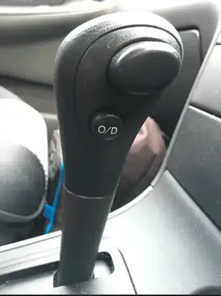 O/D button under transmission button