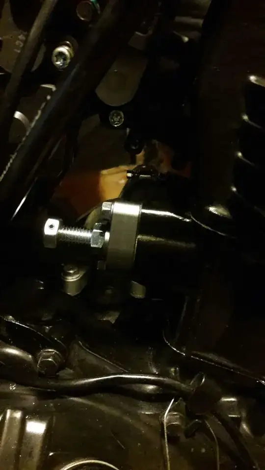 Manual chain tensioner