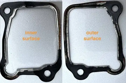 metal gasket close up for condition--both sides visible