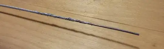 Snapped cable, solid core, wound outer layer