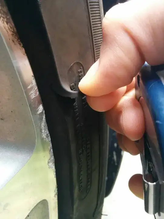 Lifting the tear to show size