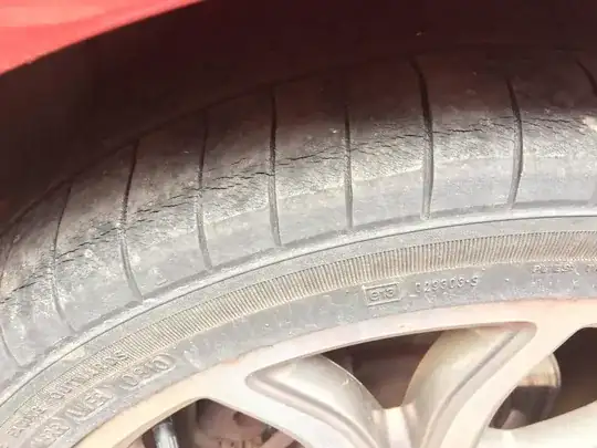 Picture of car tire with some cracking