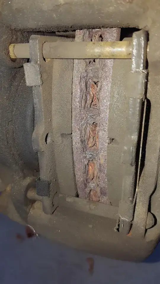 brake pad extending past disc