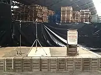 Beatles stage, made with produce crates. Rebuilt for 50th anniversary, 2014.