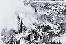 Burning Lübeck Cathedral after an air raid in 1942.