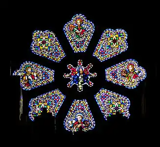 Stained glass window representing the Virgin Mary and various saints