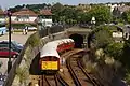 A pair of Island Line Class 483s in London Underground livery entering the Ryde tunnel.