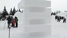 Snow sculpture at Festival du Voyageur, with the Fort Gibraltar in the background.