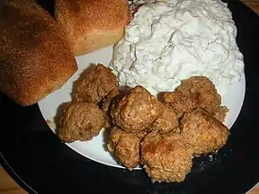 Danish frikadelle accompanied with bread and tzatziki