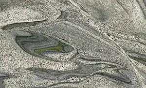 Iguana Green "Granite" (gneiss), polished stone from a quarry near Messias Targino