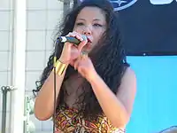 Joyo Velarde performing live in May 2009.