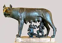 Image 30Capitoline Wolf, sculpture of the she-wolf feeding the twins Romulus and Remus, the most famous image associated with the founding of Rome. According to Livy, it was erected in 296 BC. (from Founding of Rome)