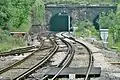 The railway tunnel to Rice Lane, viewed from the end of the platform