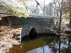 Keyhole arch bridge crossing Lake Cochituate in Natick