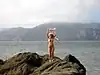 Nude woman at Baker Beach, evoking Burning Man