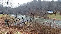 A suspension bridge over the Cane River, Ramseytown