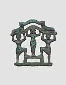 Plaque with a nude female between two bearded males wearing kilts; circa 2000–1600 BC; bronze; 9.7 x 9.7&nbsp;cm; Metropolitan Museum of Art