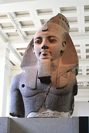 The Younger Memnon (c. 1250 BC), a statue depicting Ramesses II, from the Ramesseum in Thebes. Currently on display at the British Museum in London.