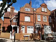 Red brick terrace, Bedford Park. Edward John May, 1880