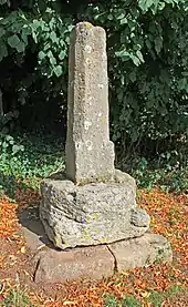 Cross 15 m north of St Peter's Church