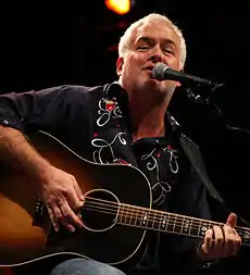 Rutherford performing at the CMA Songwriters' Series on September 3, 2014.