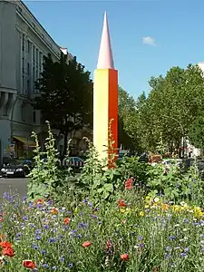Rainbow Column at Nollendorfplatz by Salomé, erected by the AHA&nbsp;[de; es; ru] (2000)