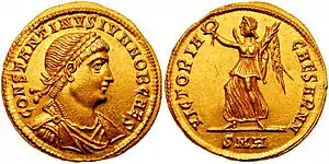 Image 21Solidus issued under Constantine II, and on the reverse Victoria, one of the last deities to appear on Roman coins, gradually transforming into an angel under Christian rule (from Roman Empire)