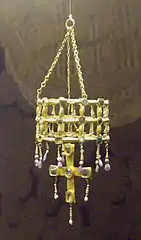 Votive crown and cross.