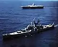 USS Newport News alongside USS Enterprise (CVAN-65) In 1962.