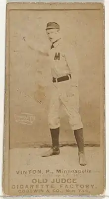 Standing man in baseball uniform