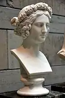 Young woman with flowers wreath in her hair, by Johan Niklas Byström. Marble. Nationalmuseum, Stockholm, Sweden