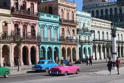 A series of colorful buildings and cars