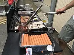 Democracy sausages being barbecued at the 2017 Queensland state election