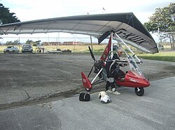 Professional pilot Paul Nugent getting ready to explore Cobblers Reef from 500&nbsp;m with a seat for his pillion passenger-photographer behind.