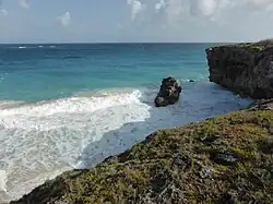 The rock on the left (viewed from the sea) can be seen on the right from the land.