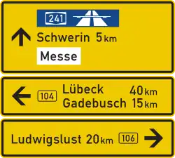 typical black on yellow direction sign with different colors for autobahn and a local destination